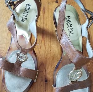 Michael Kors 4" stacked heel sandal.